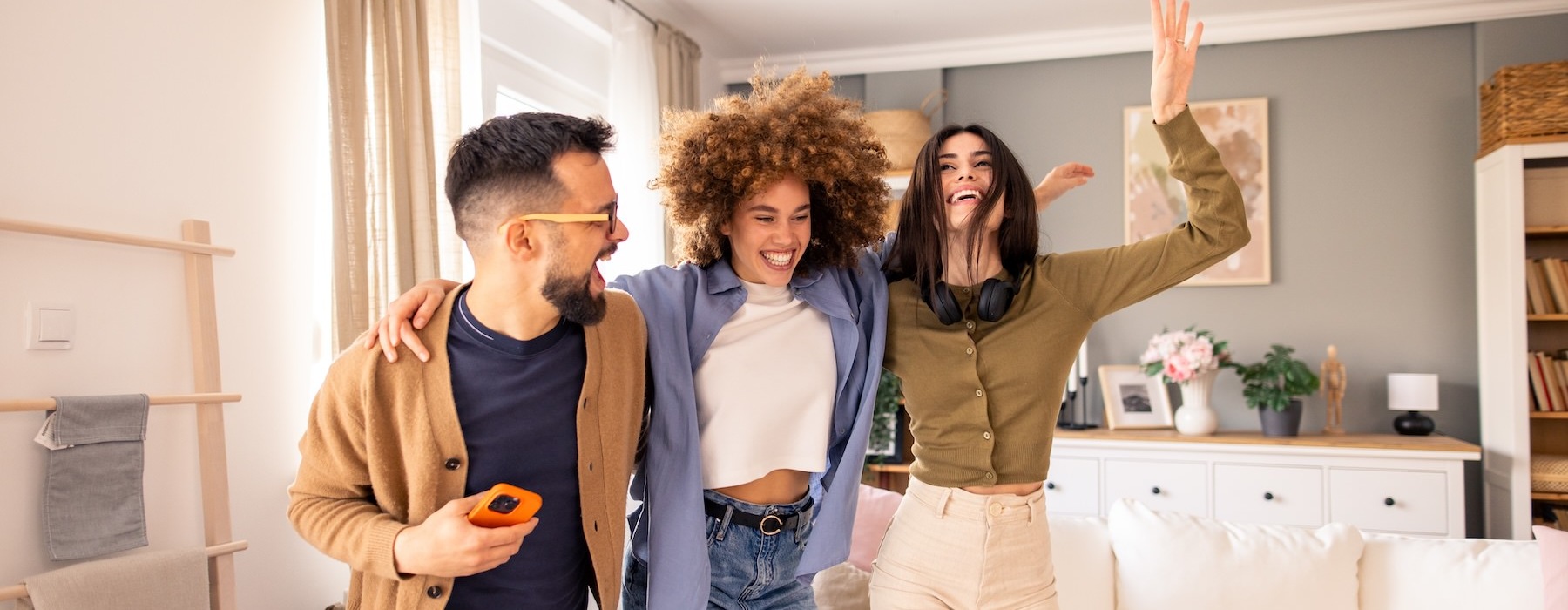 people laughing in a living room