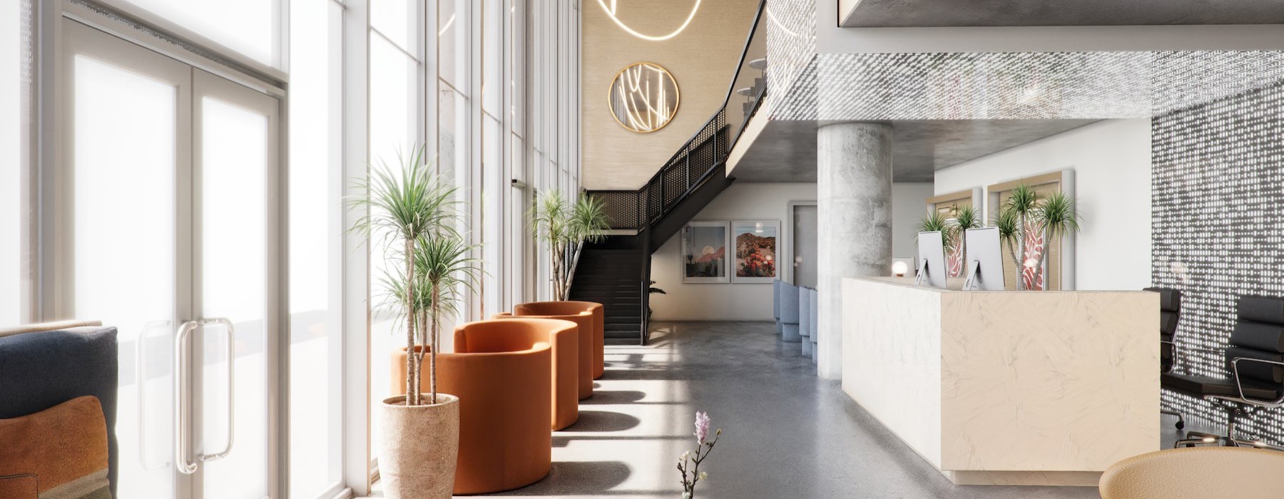 a lobby with a front desk and plants