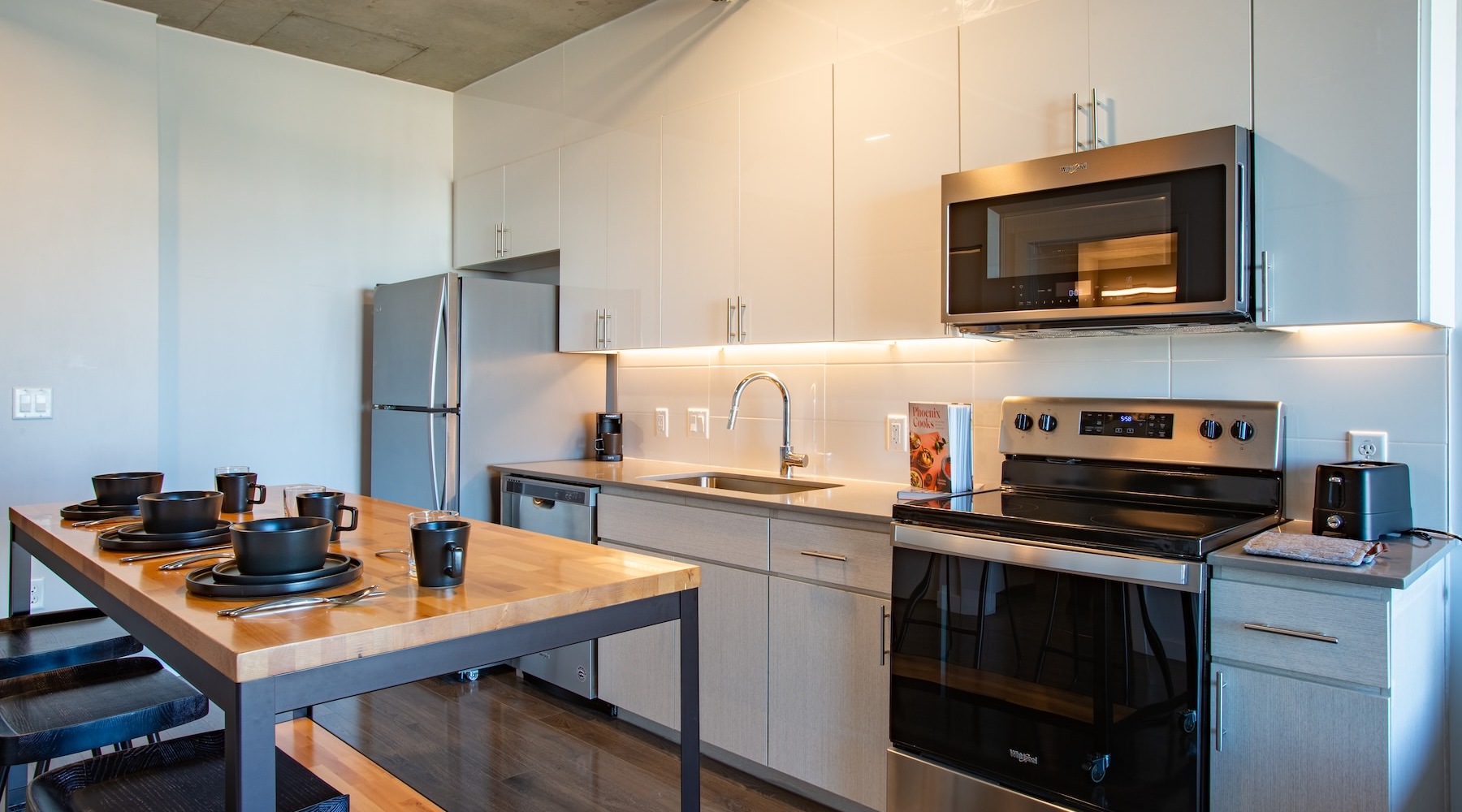 a kitchen with white cabinets